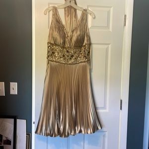 Brand new size 16 dress gold with rhinestones